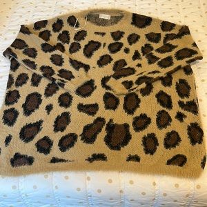 lightly worn leopard sweater